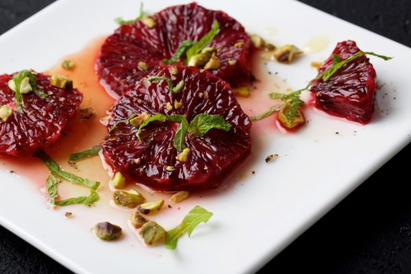 Oranges With Mint-Infused Honey and Toasted Pistachios