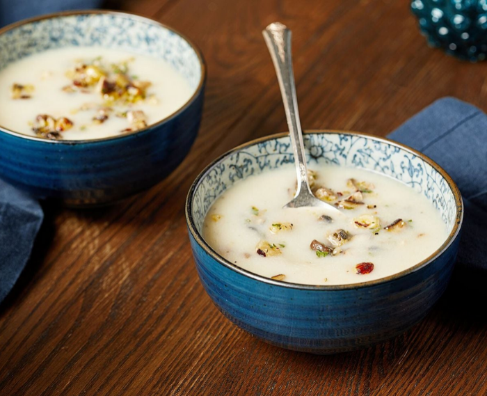 Creamy Cauliflower Soup With Mushroom and Hazelnut Topping