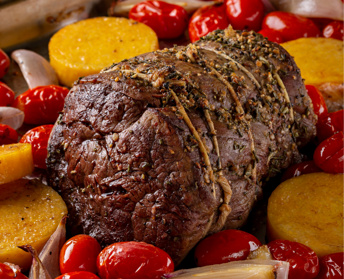 Beef Tenderloin with Rosemary, Balsamic Roasted Tomatoes, Shallots and Polenta