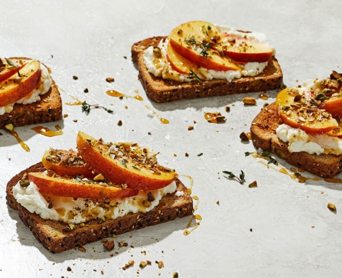 Ricotta Toasts With Peaches and Pistachios