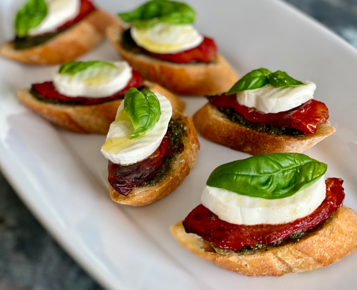 Winter Caprese Toasts with Roasted Tomatoes and Pesto